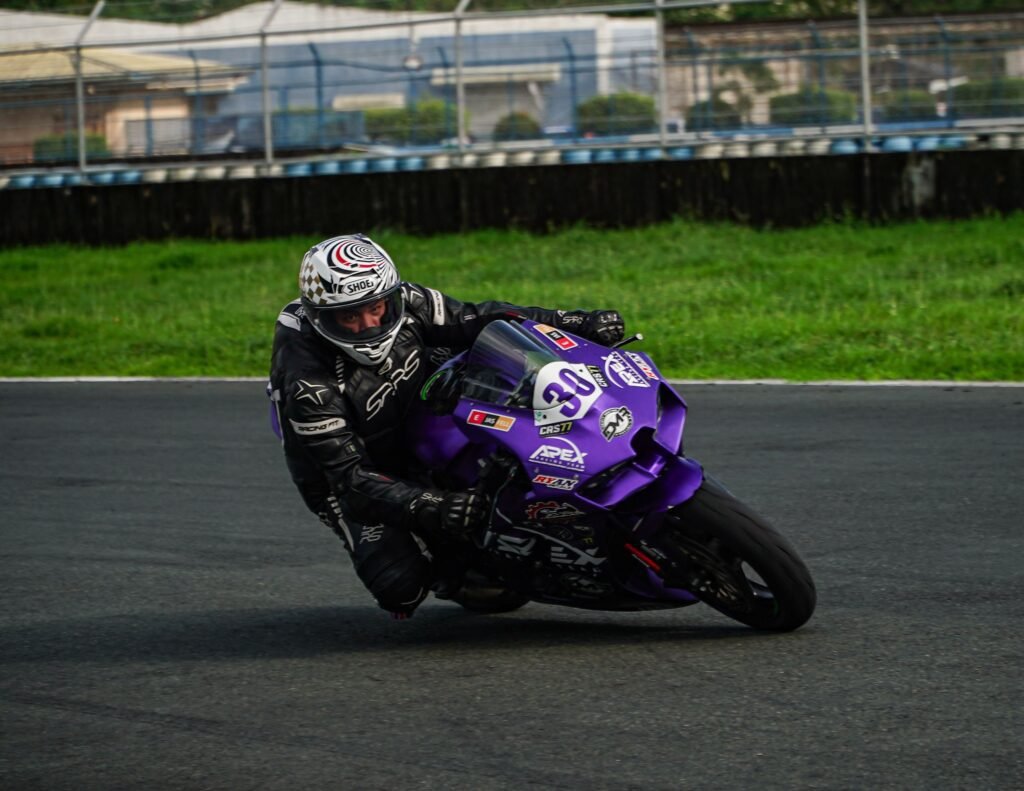 Intense motorcycle racing captured on a track in Mabalacat, Philippines.